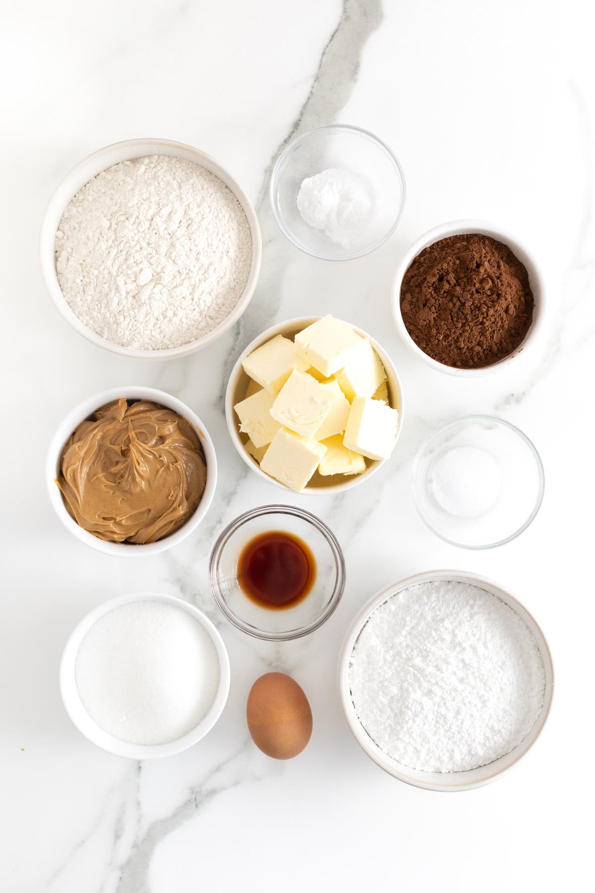 Ingredients to make peanut butter filled chocolate sandwich cookies.