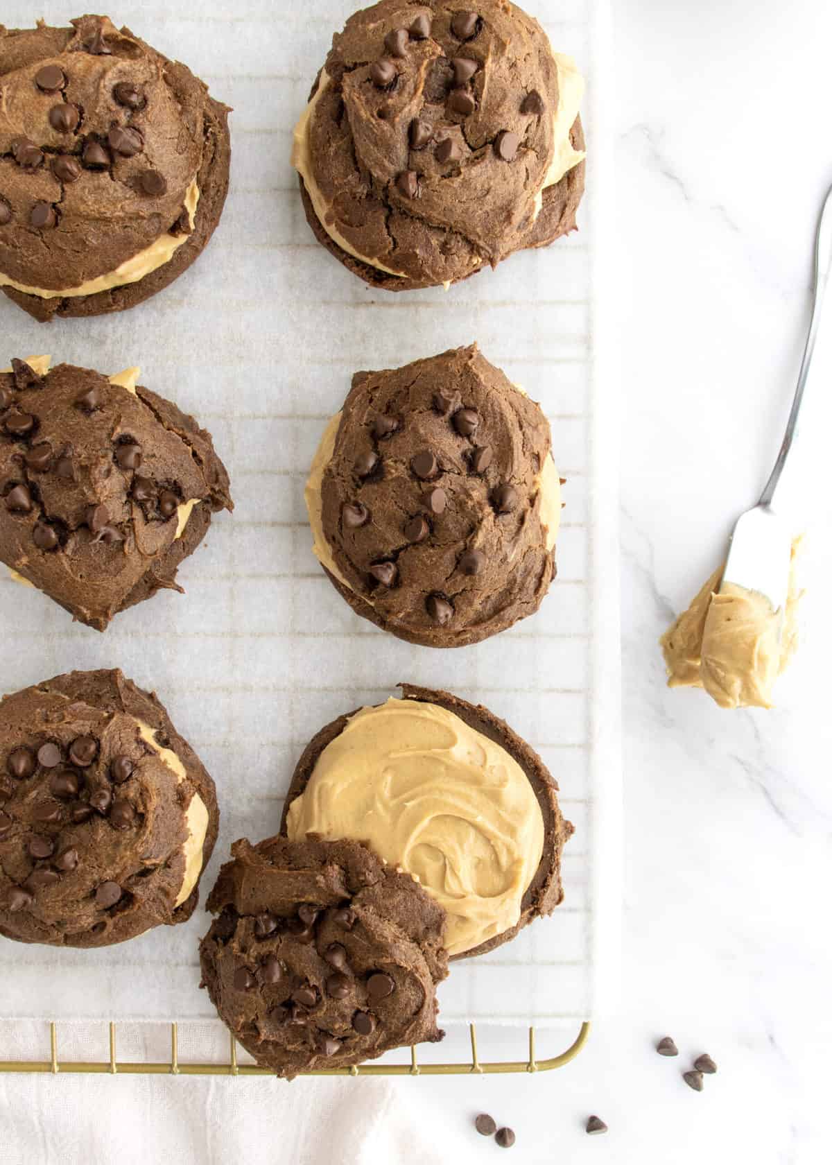 Chocolate Peanut Butter Cream Puffs by The BakerMama