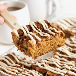 Cream cheese coffee cake on a spatula.
