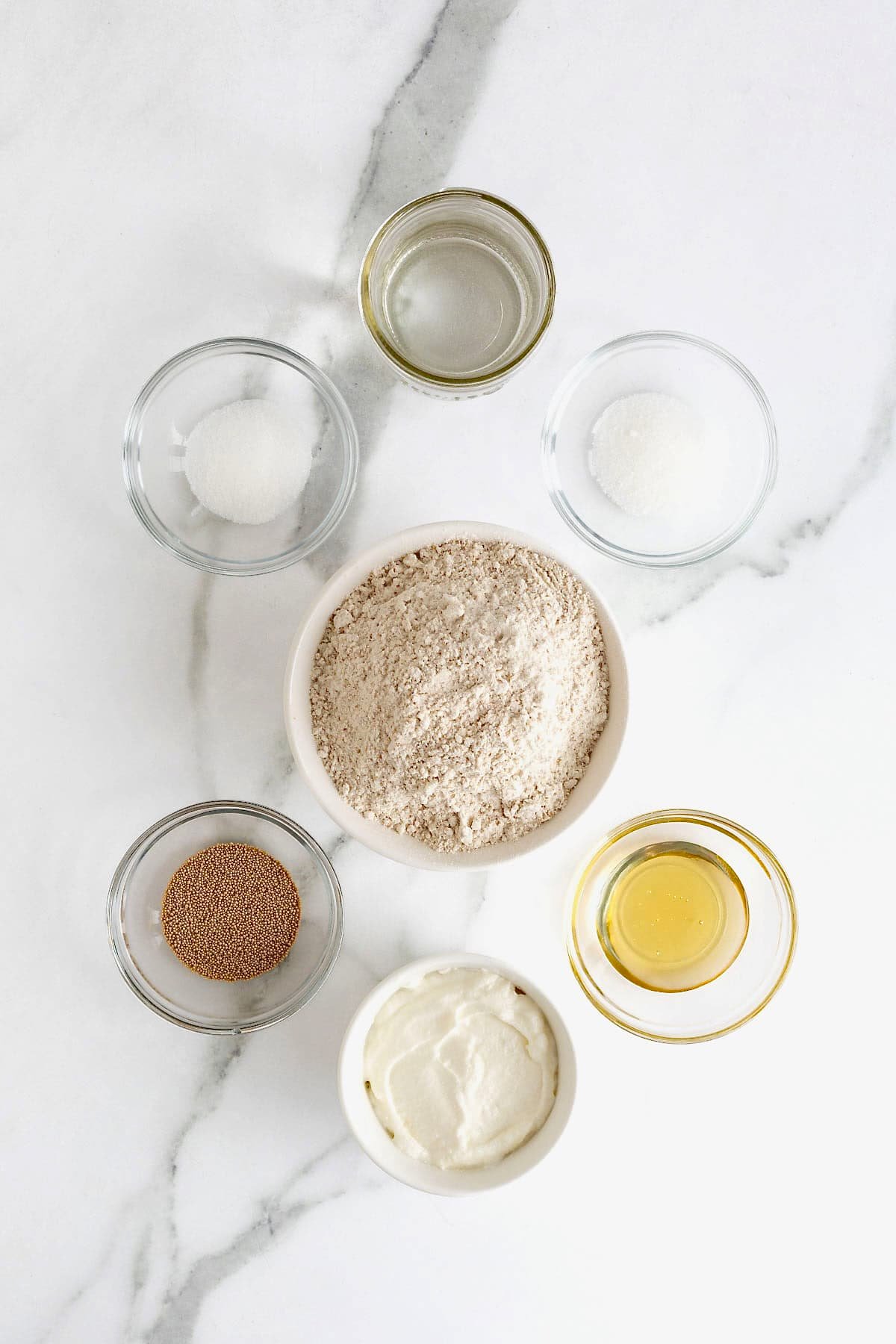 Ingredients to make whole wheat greek yogurt pizza dough.