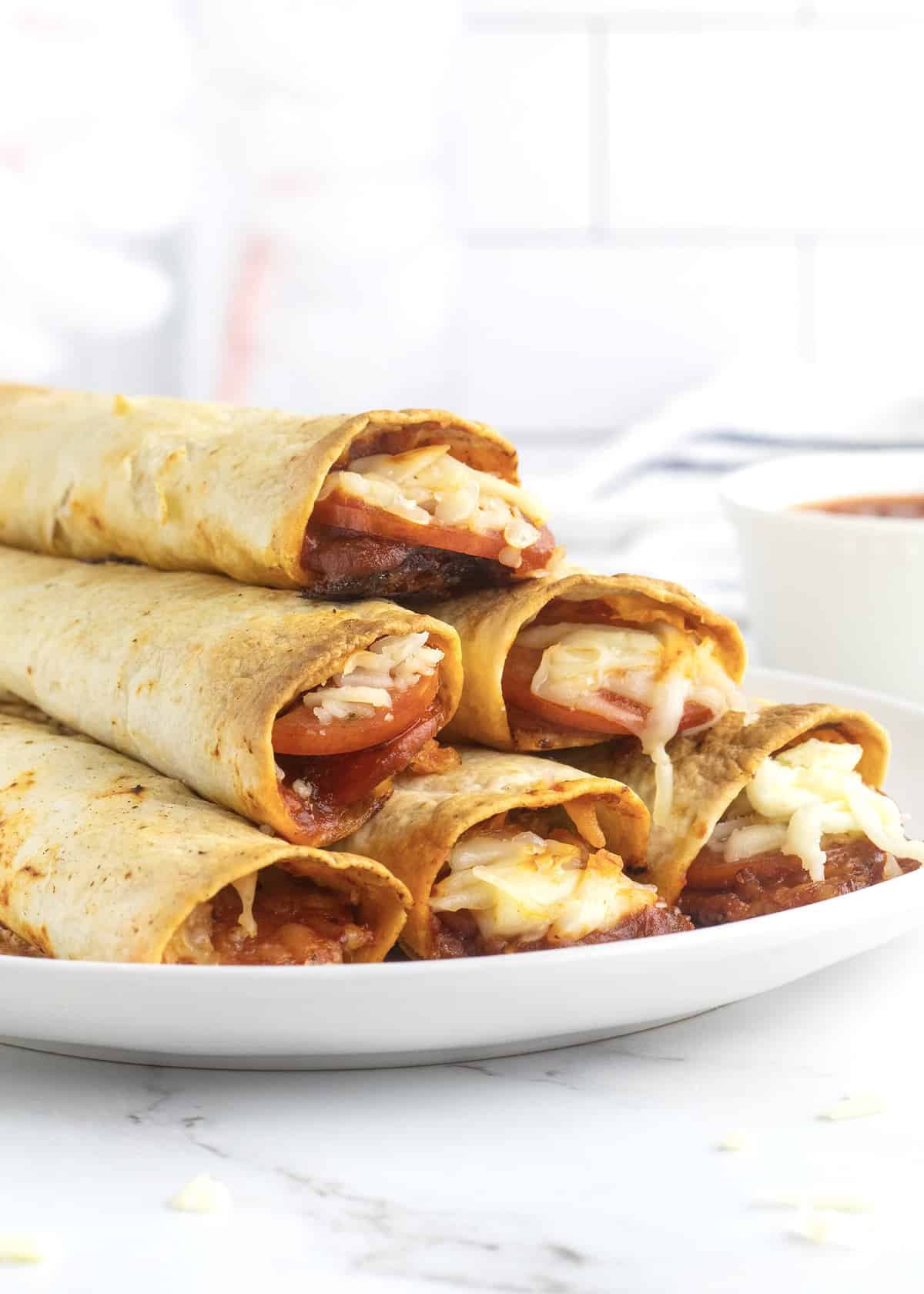 Baked Pizza Taquitos The BakerMama