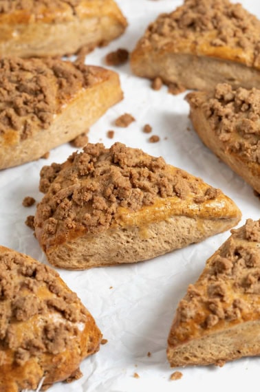 Seven snickerdoodle streusel scenes on a white surface.