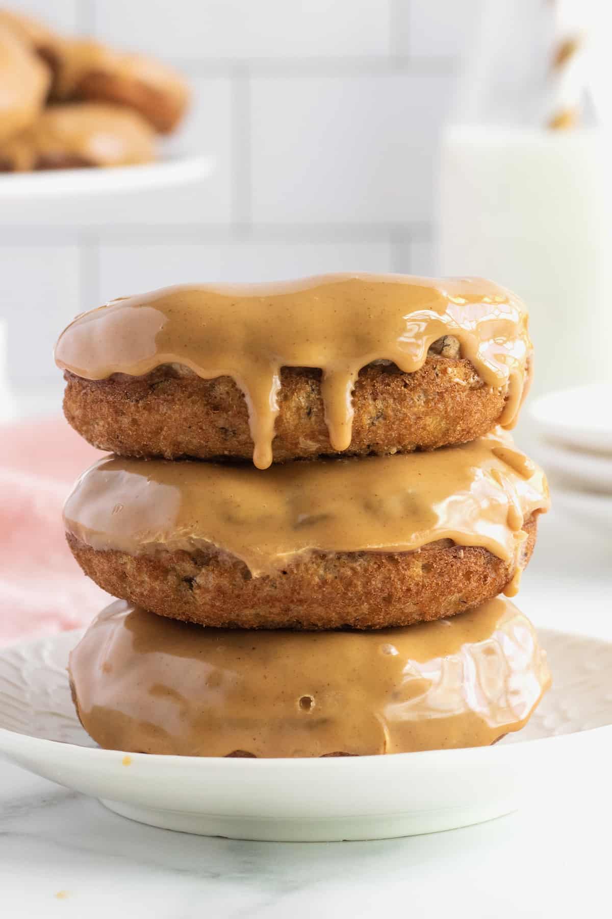 Whole Wheat Baked Banana Donuts with a Peanut Butter Glaze by The BakerMama