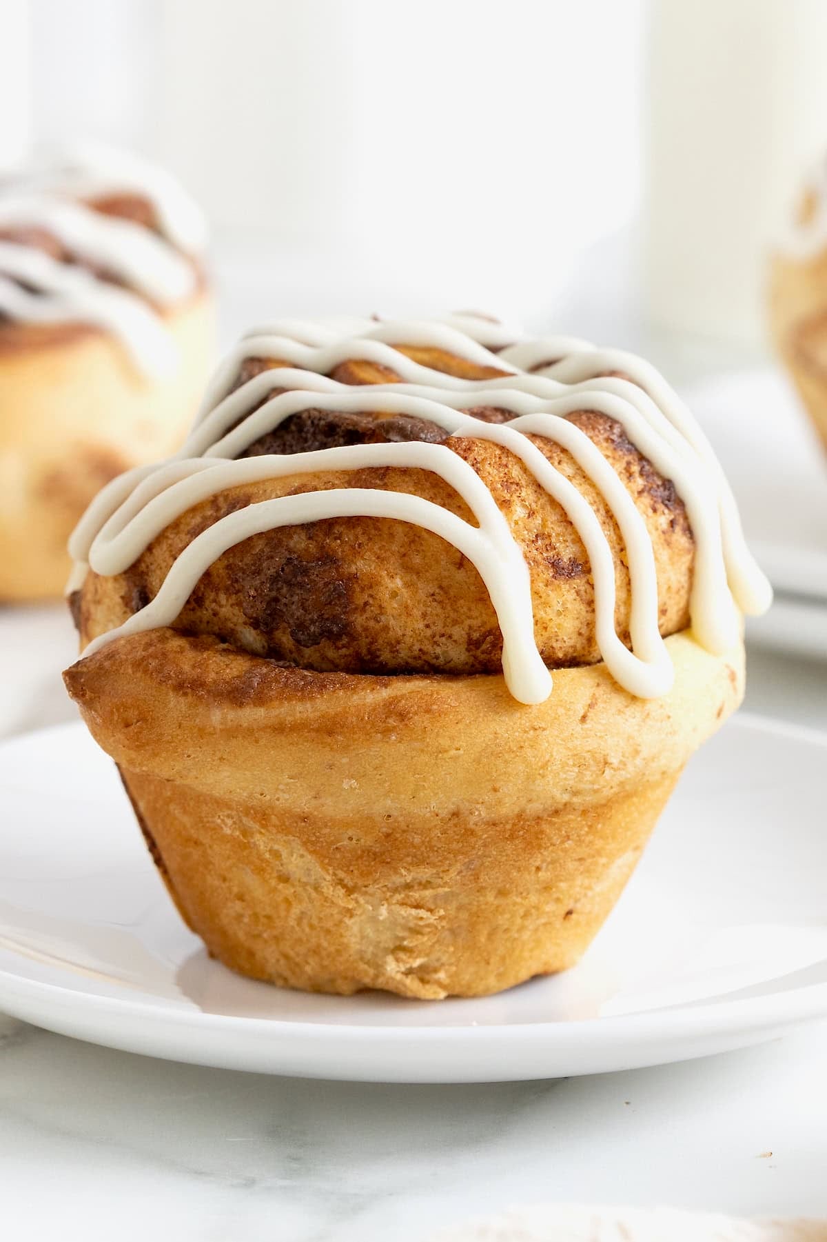 A Nutella roll drizzled with icing.