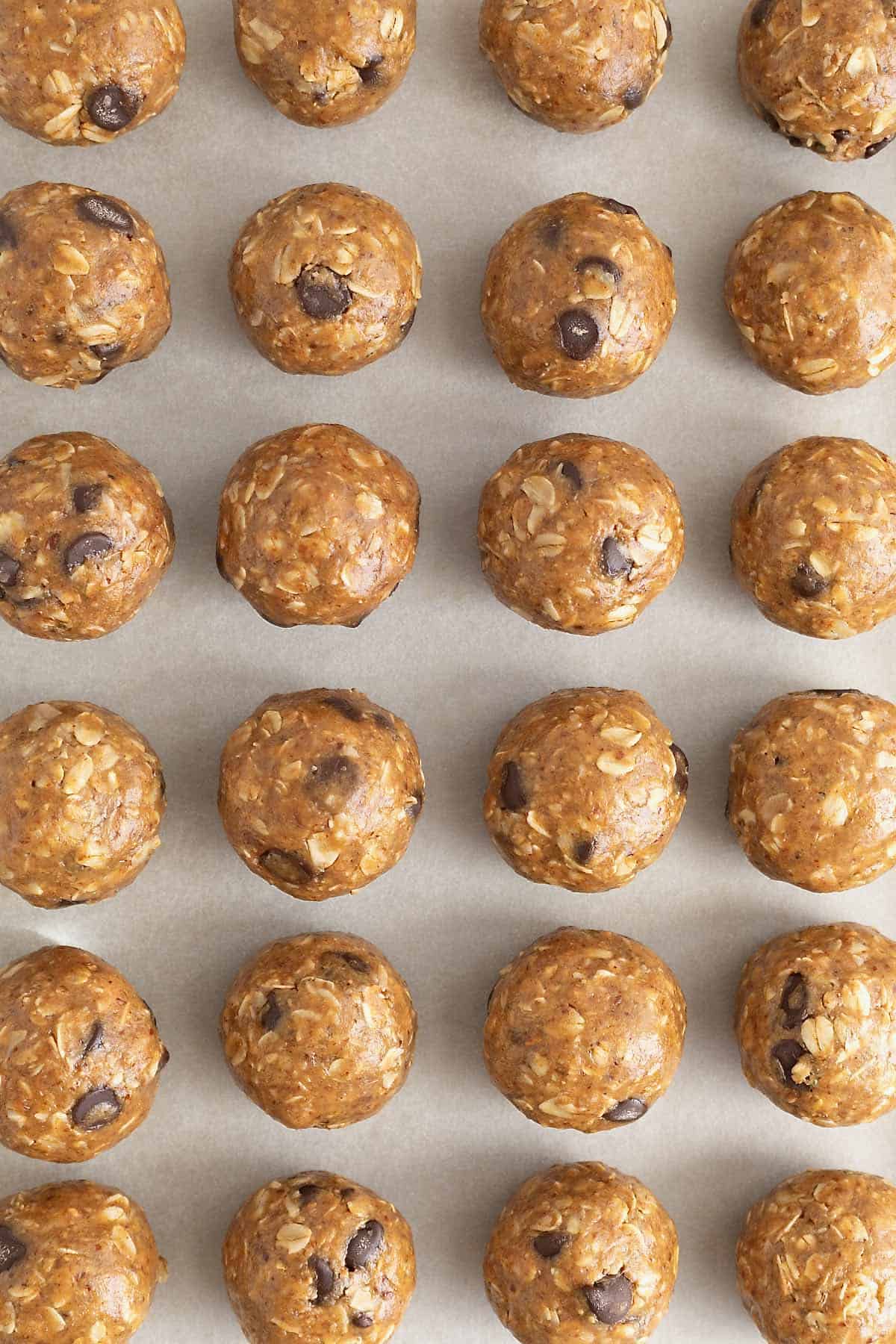 No-bake lactation bites on a parchment lined surface.