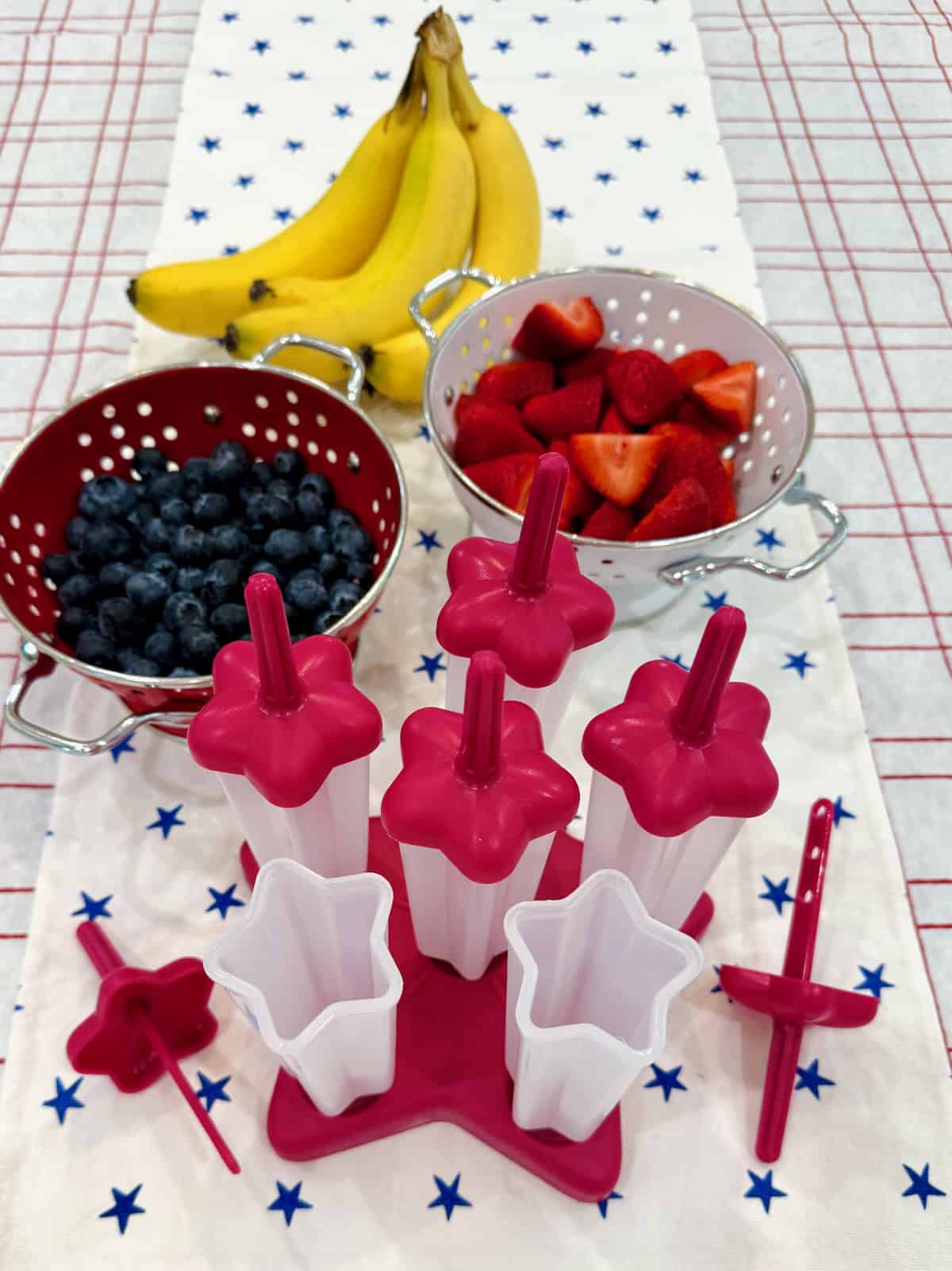 Ingredients to make patriotic fruit pops.
