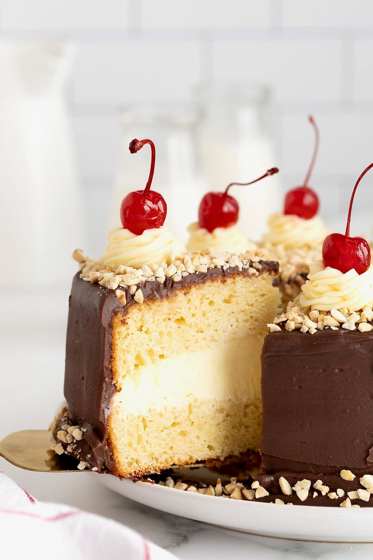 A slice being lifted from a hot fudge sundae cake.
