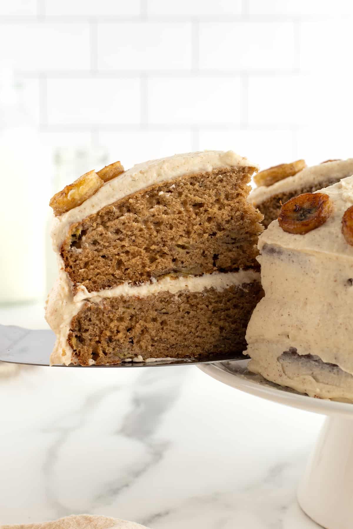 Banana Cake with Brown Butter Frosting by The BakerMama