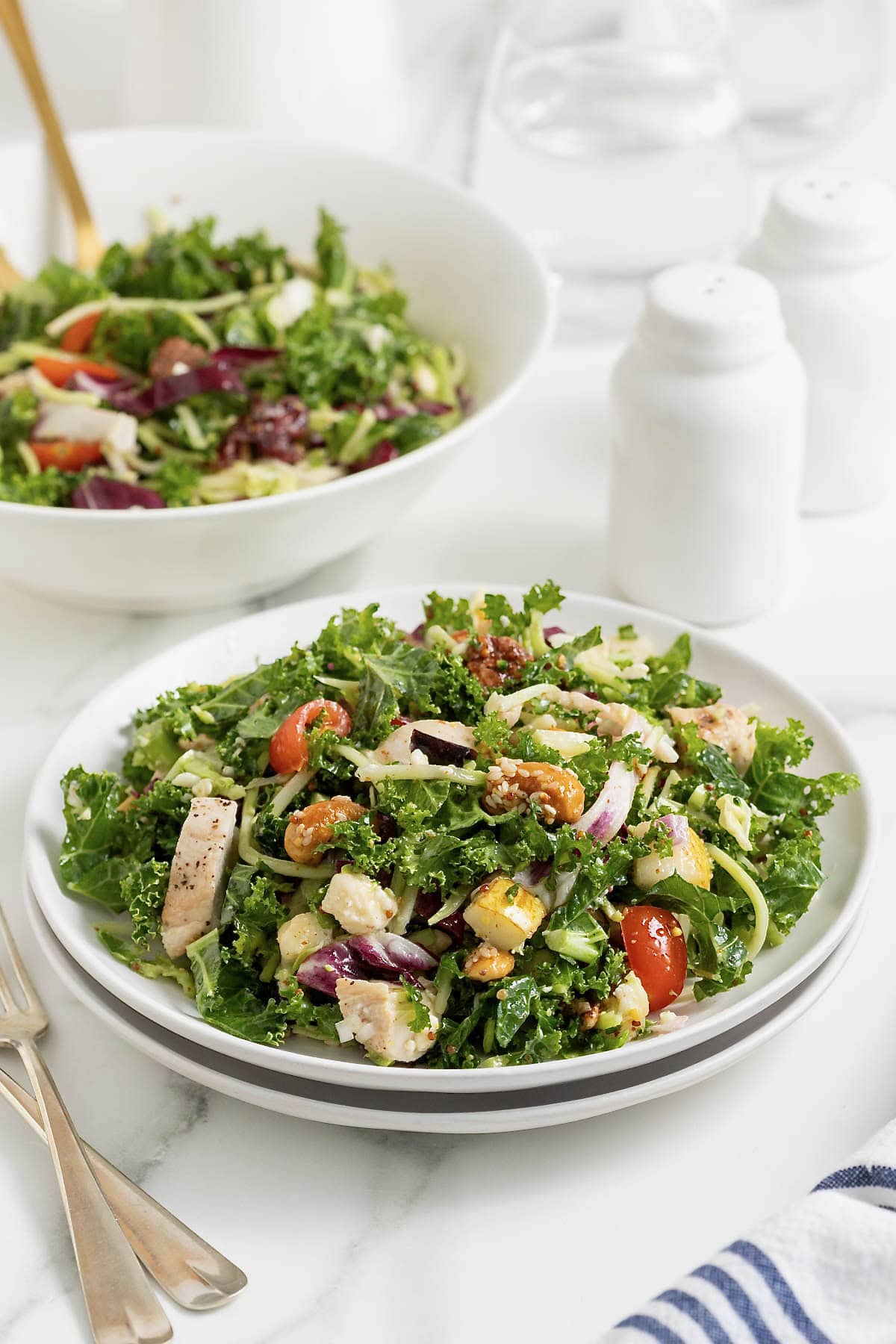 A white salad plate of lunch salad.