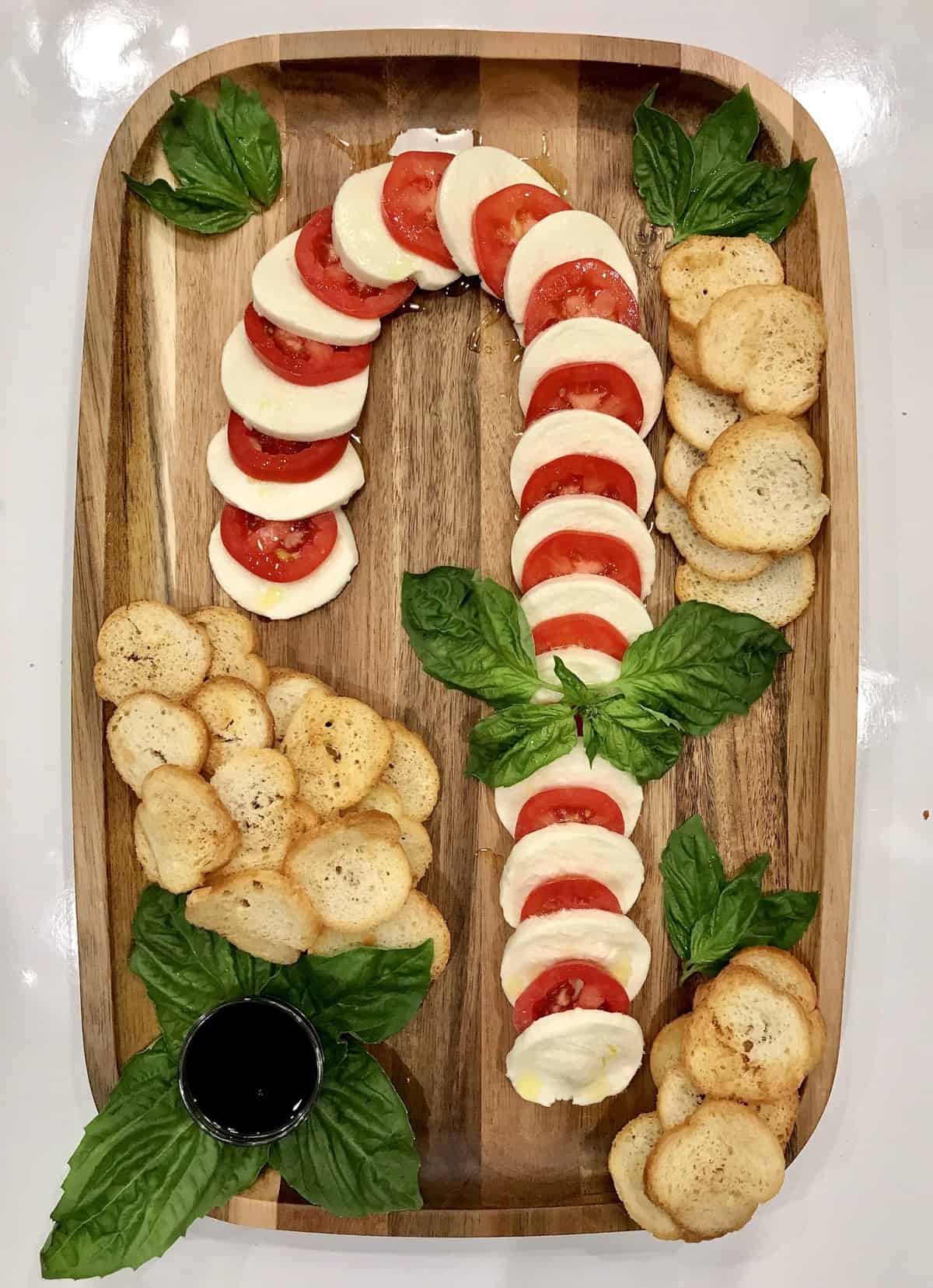 Caprese Candy Cane Board from Beautiful Boards Cookbook by Maegan Brown