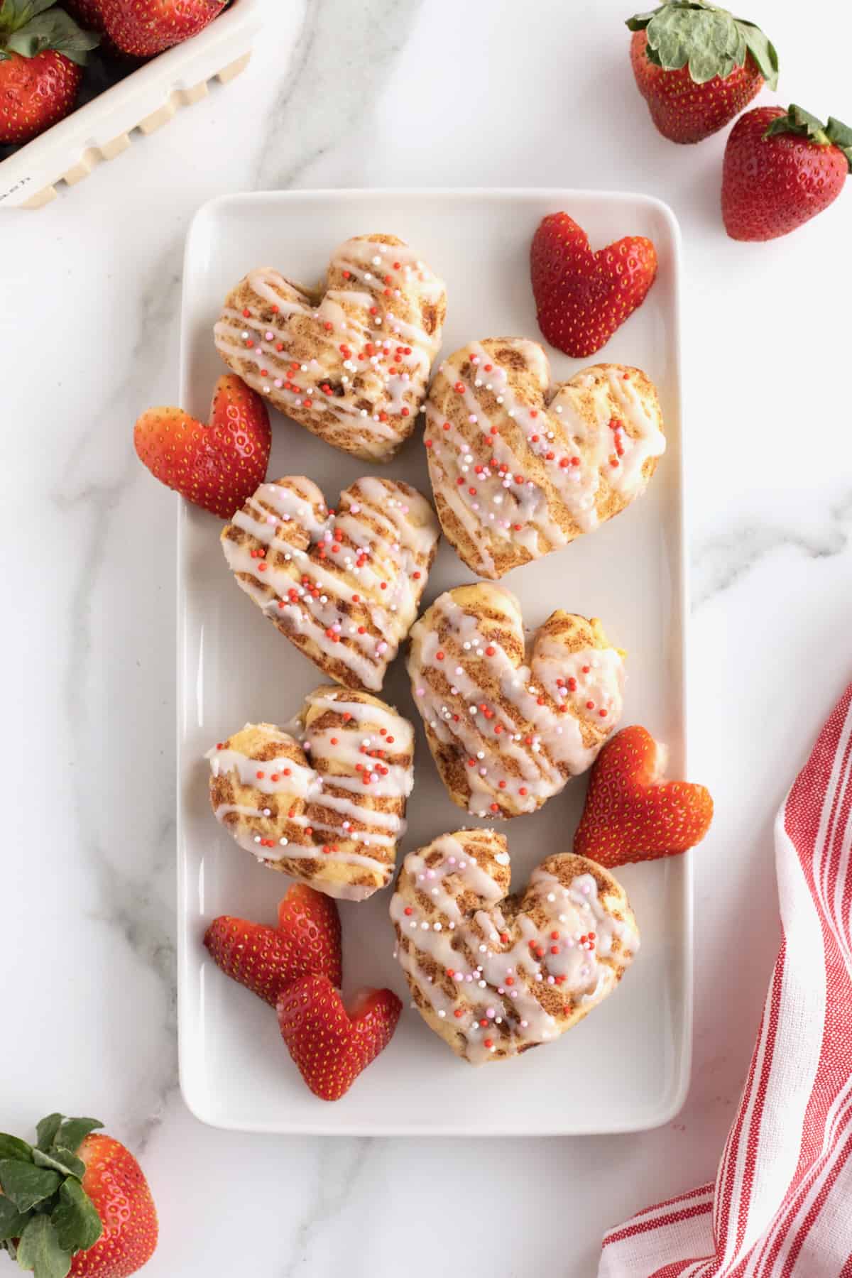 Heart Shaped Cinnamon Rolls by The BakerMama