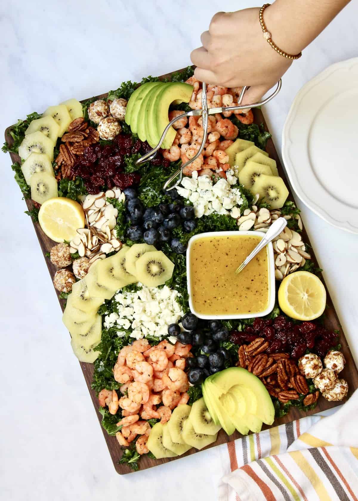 Kale + SunGold Kiwi Salad Board by The BakerMama