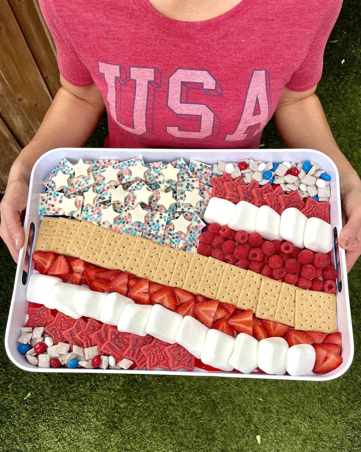 Fourth of July S'mores tray with treats laid out to mimic the American Flag. 