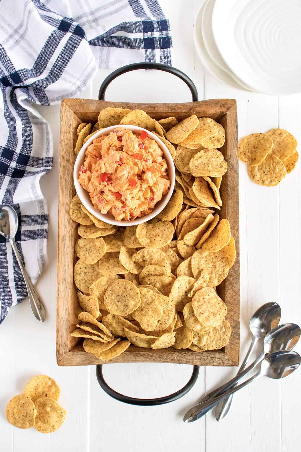 Pimento Cheese Dip on a tray with chips by The BakerMama