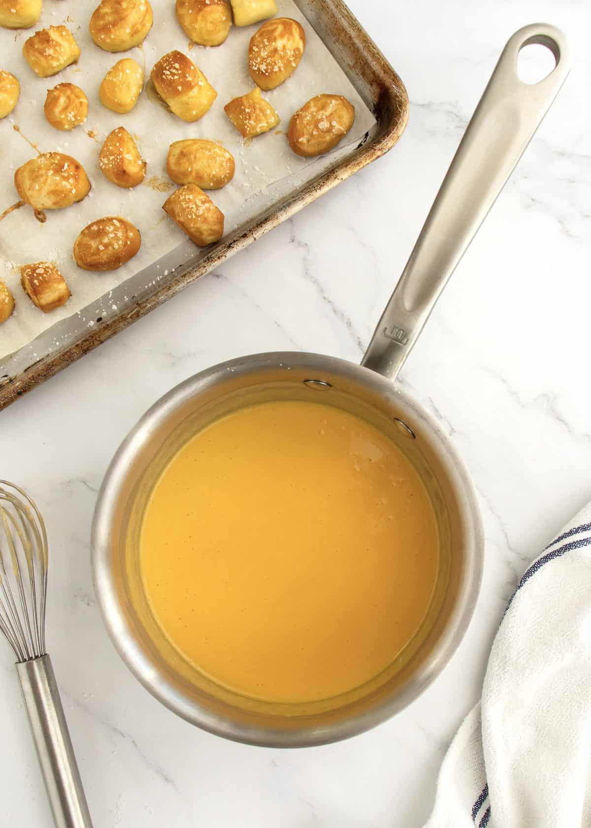 Soft Pretzel Bites with Cheese Sauce by The BakerMama