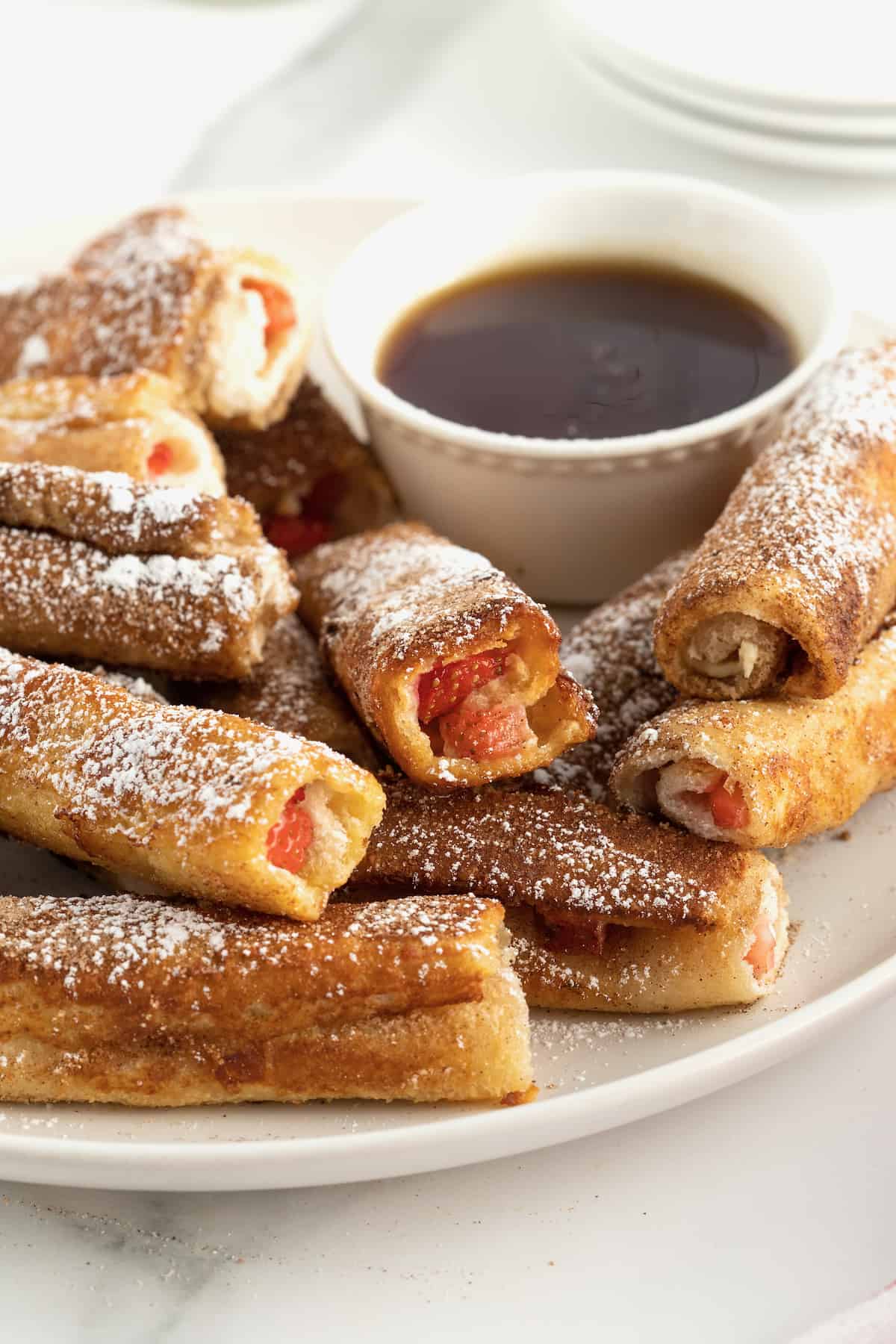 Strawberry Cream Cheese French Toast Roll Ups by The BakerMama