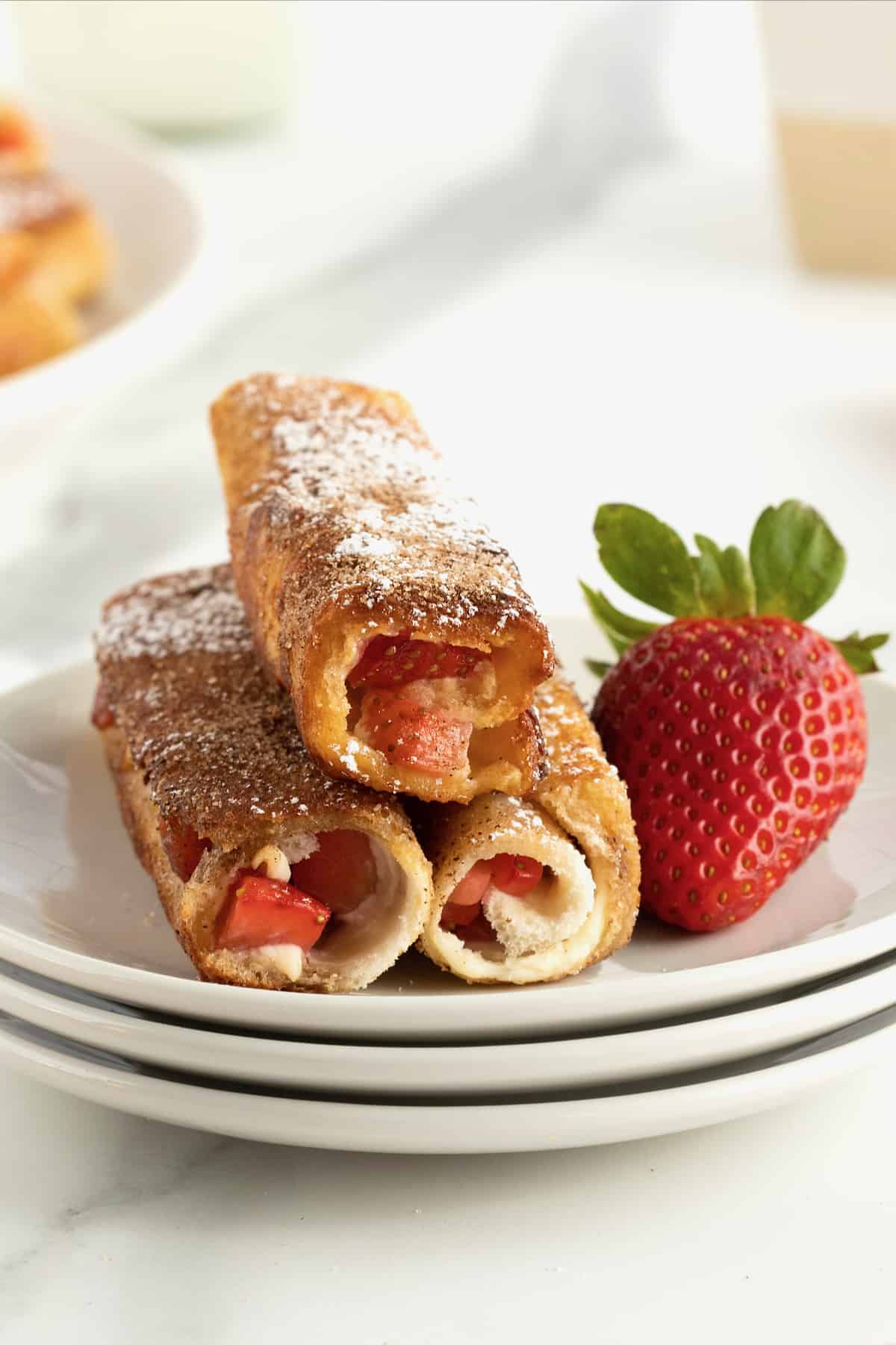 Strawberry Cream Cheese French Toast Roll Ups by The BakerMama