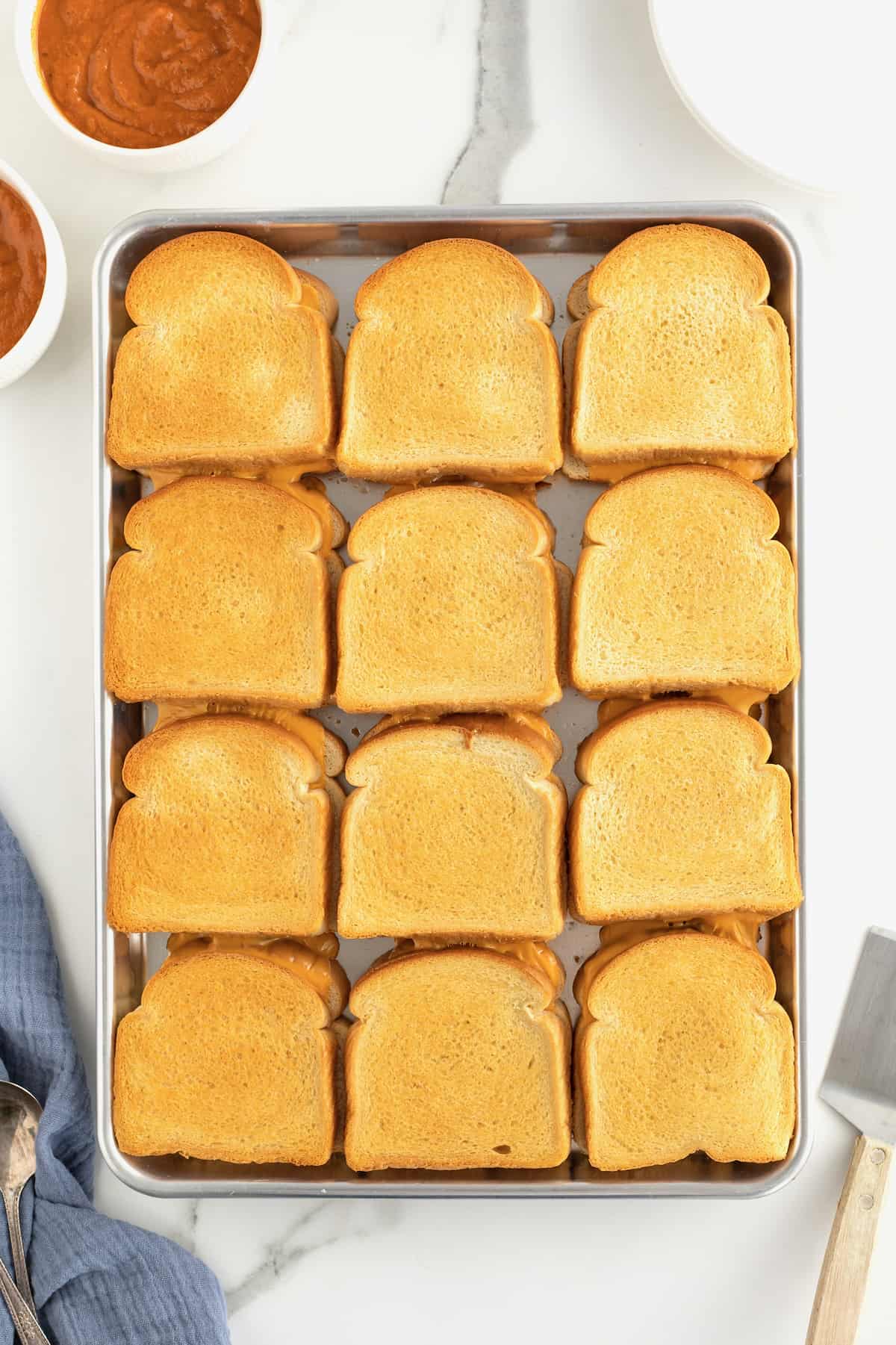 Sheet Pan Grilled Cheese Sandwiches by The BakerMama