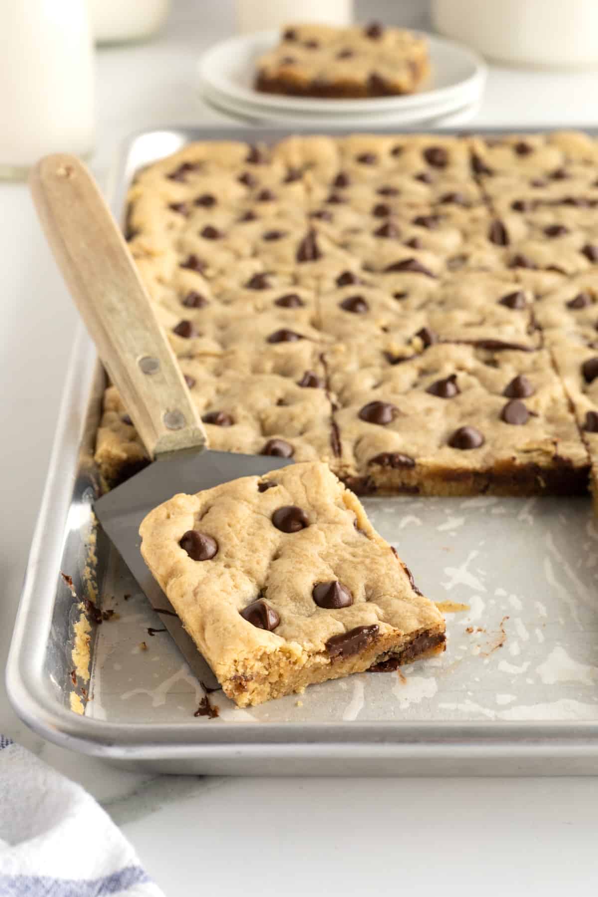 Sheet Pan Chocolate Chip Cookie Bars by The BakerMama