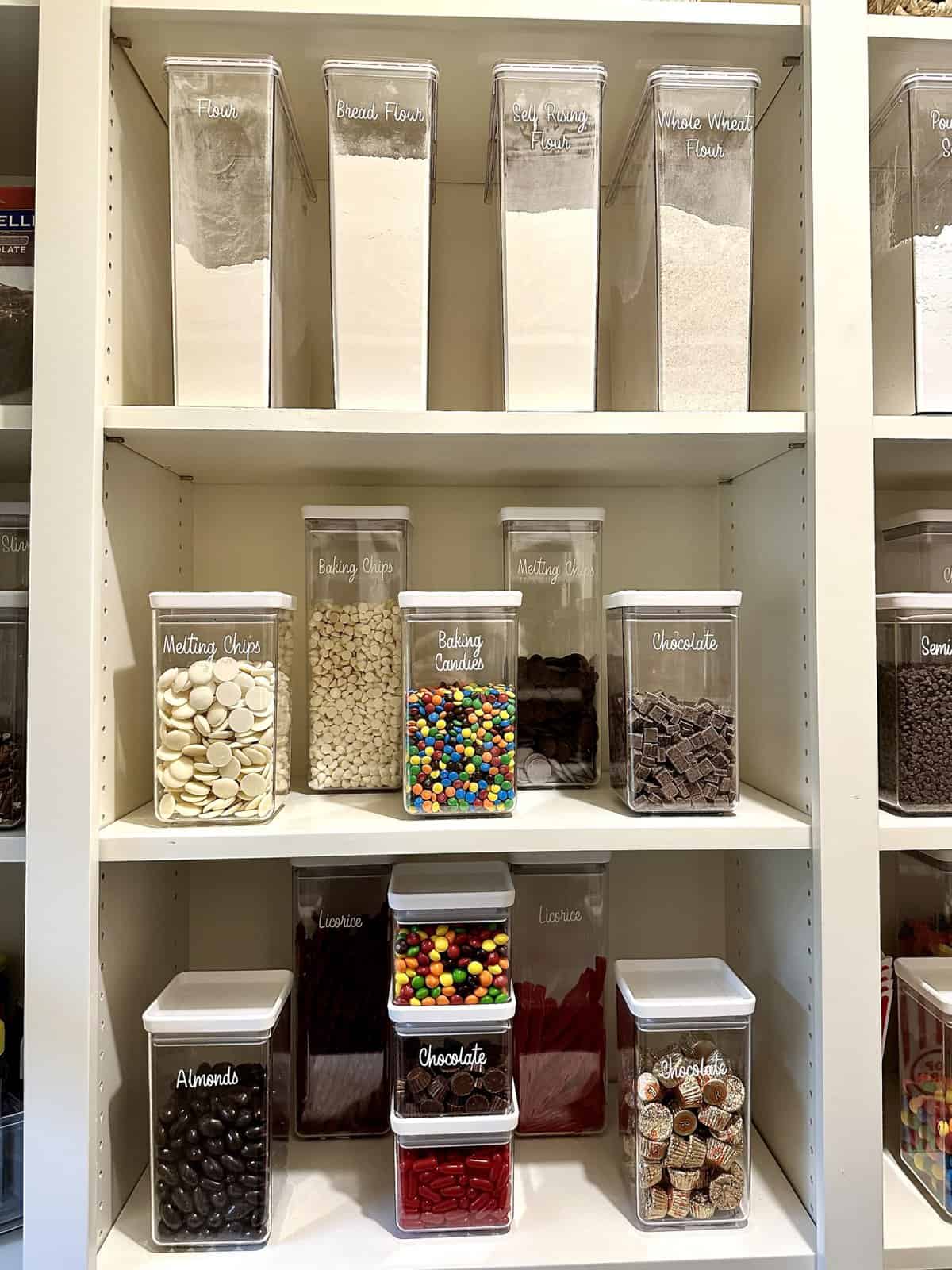 Clear containers of food labeled in The Container Store font.