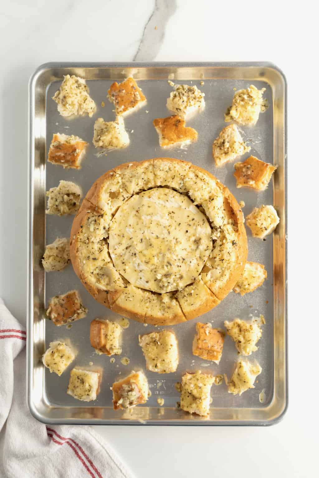 Garlic Butter Baked Brie in a Bread Bowl The BakerMama