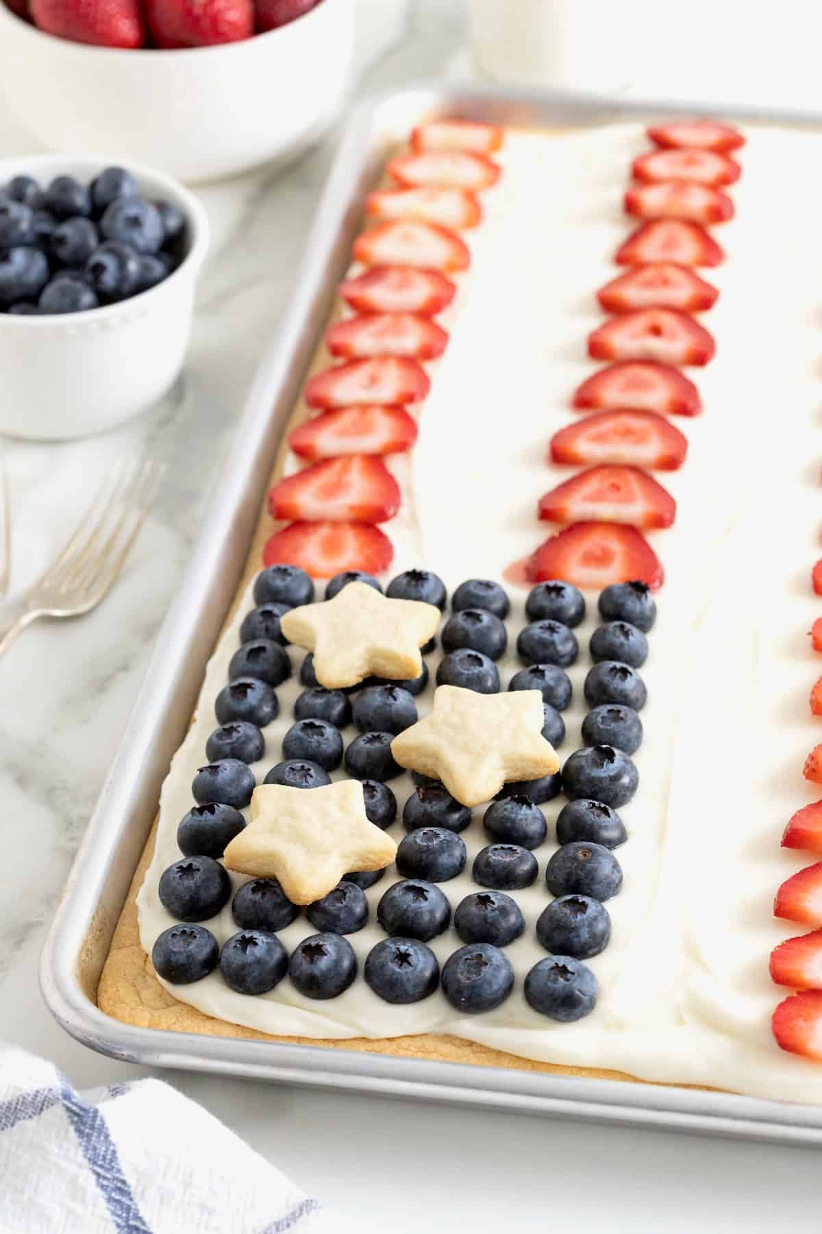 A large fruit pizza decorated to look like the American Flag.