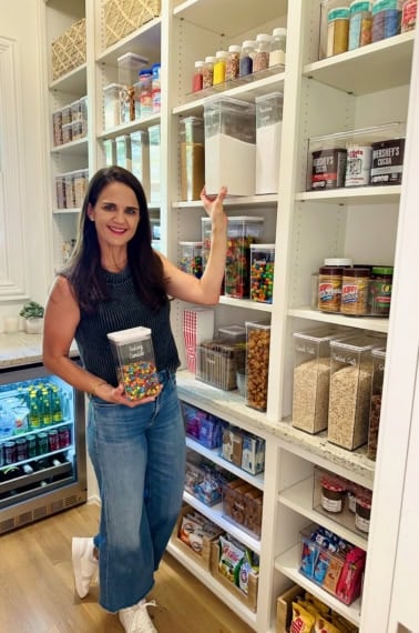 Maegan Brown standing in her pantry.