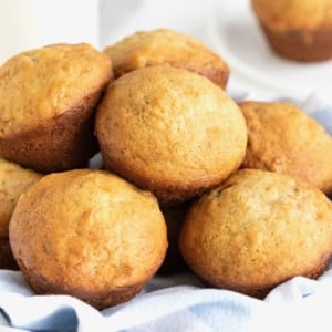 A large white bowl of banana muffins.