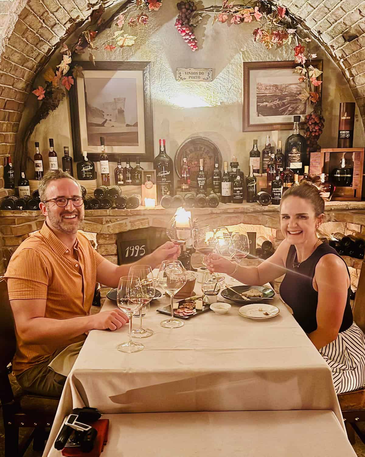 Maegan and Brandon Brown drinking wine.