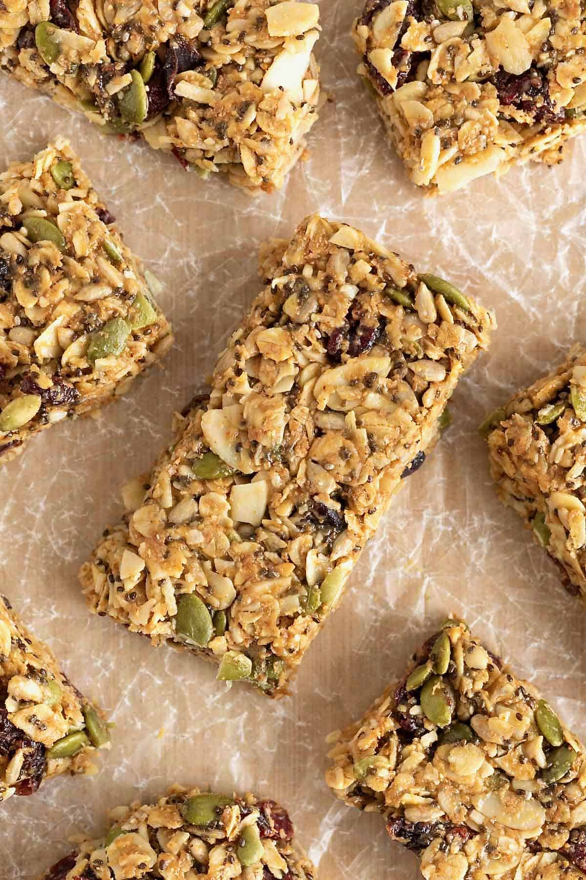 Snack bars on a wooden cutting board.