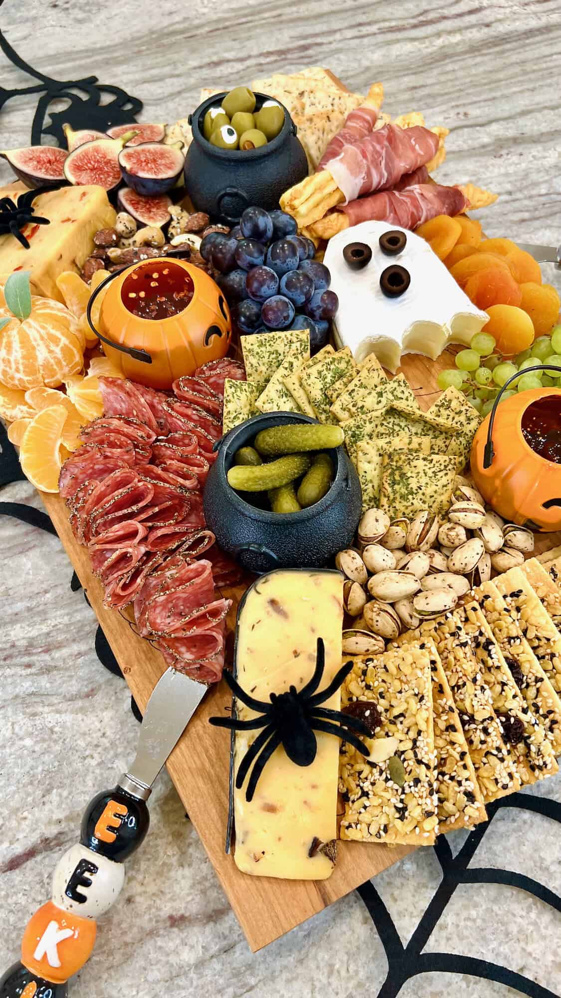 The BakerMama's signature board filled in with Halloween themed foods.