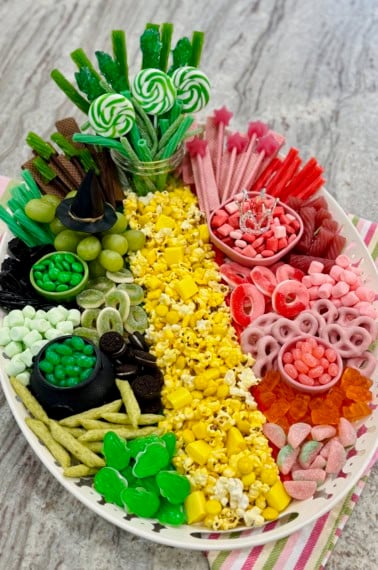 A snack board to celebrate the movie Wicket on a gray marble counter.