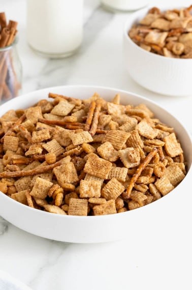 A large white bowl of Churro Snack Mix.