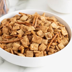 A large white bowl of Churro Snack Mix.
