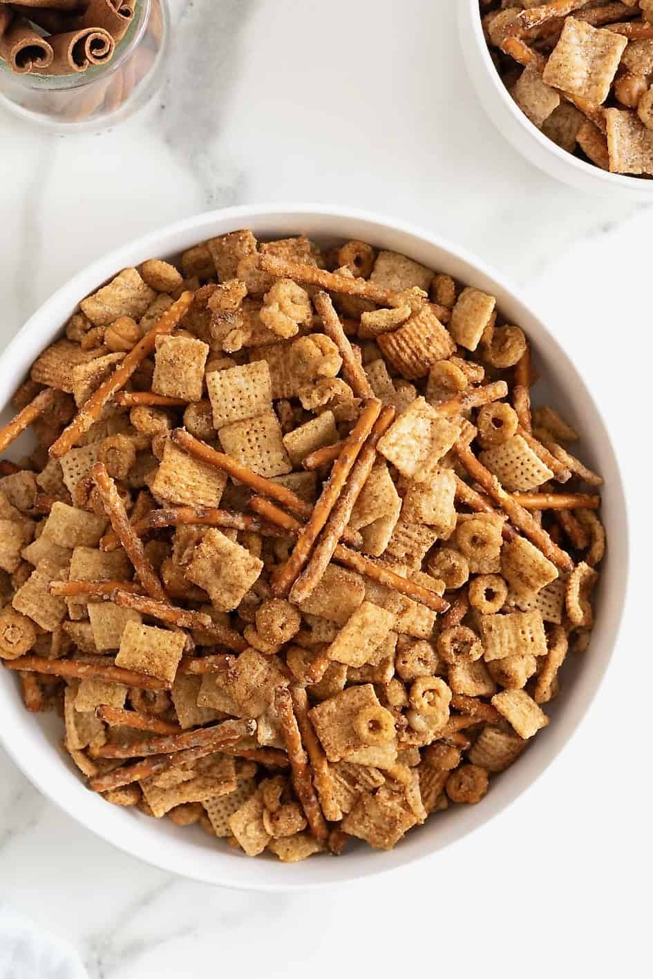 A large white bowl of Churro Snack Mix.
