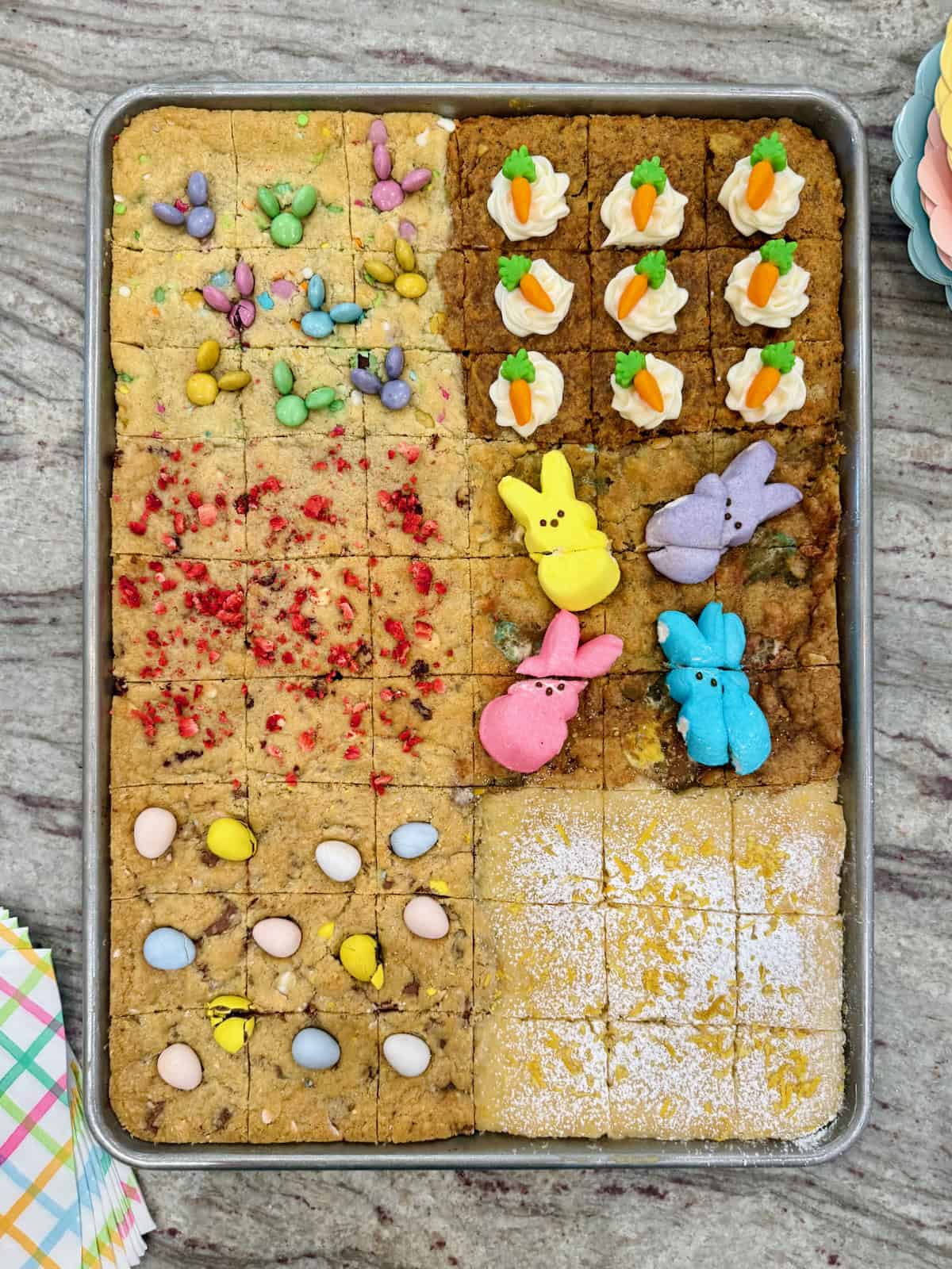 54 cookie bars in a sheet pan decorated for Easter.