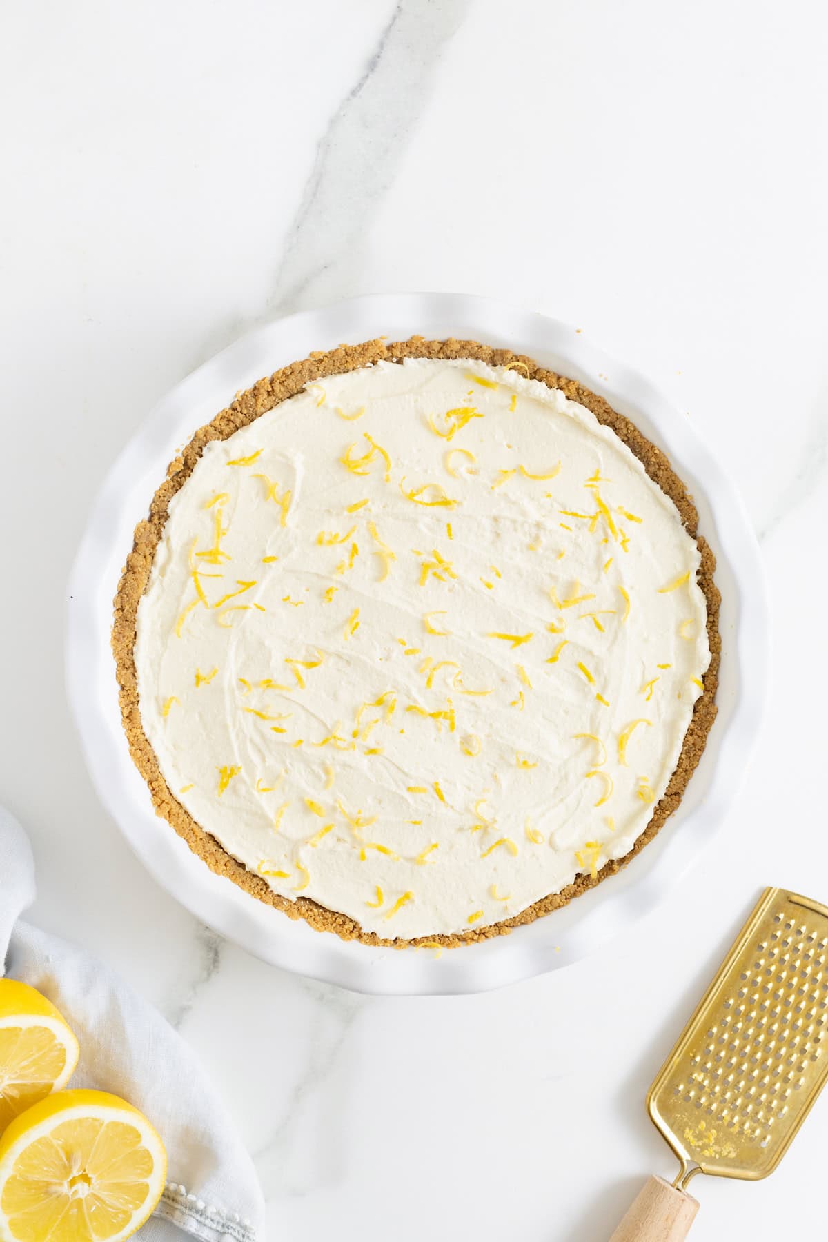 lemon zest on a frozen lemonade pie.