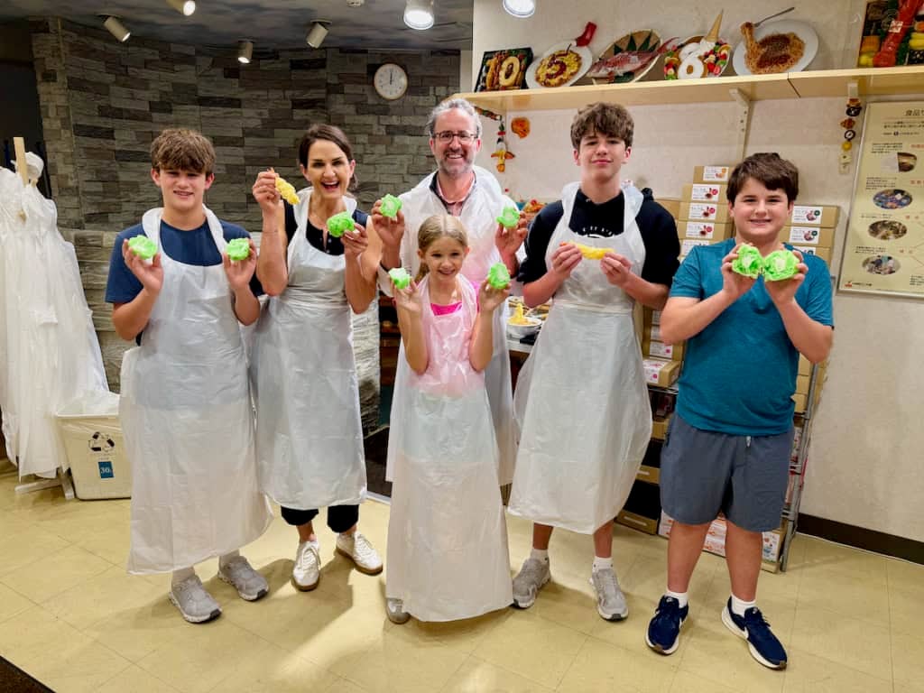 The Brown Family learning to make plastic food.