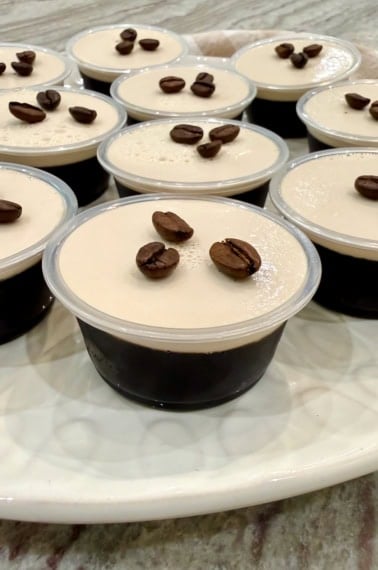 A platter filled with espresso martini jello shots.