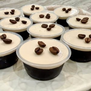 A platter filled with espresso martini jello shots.