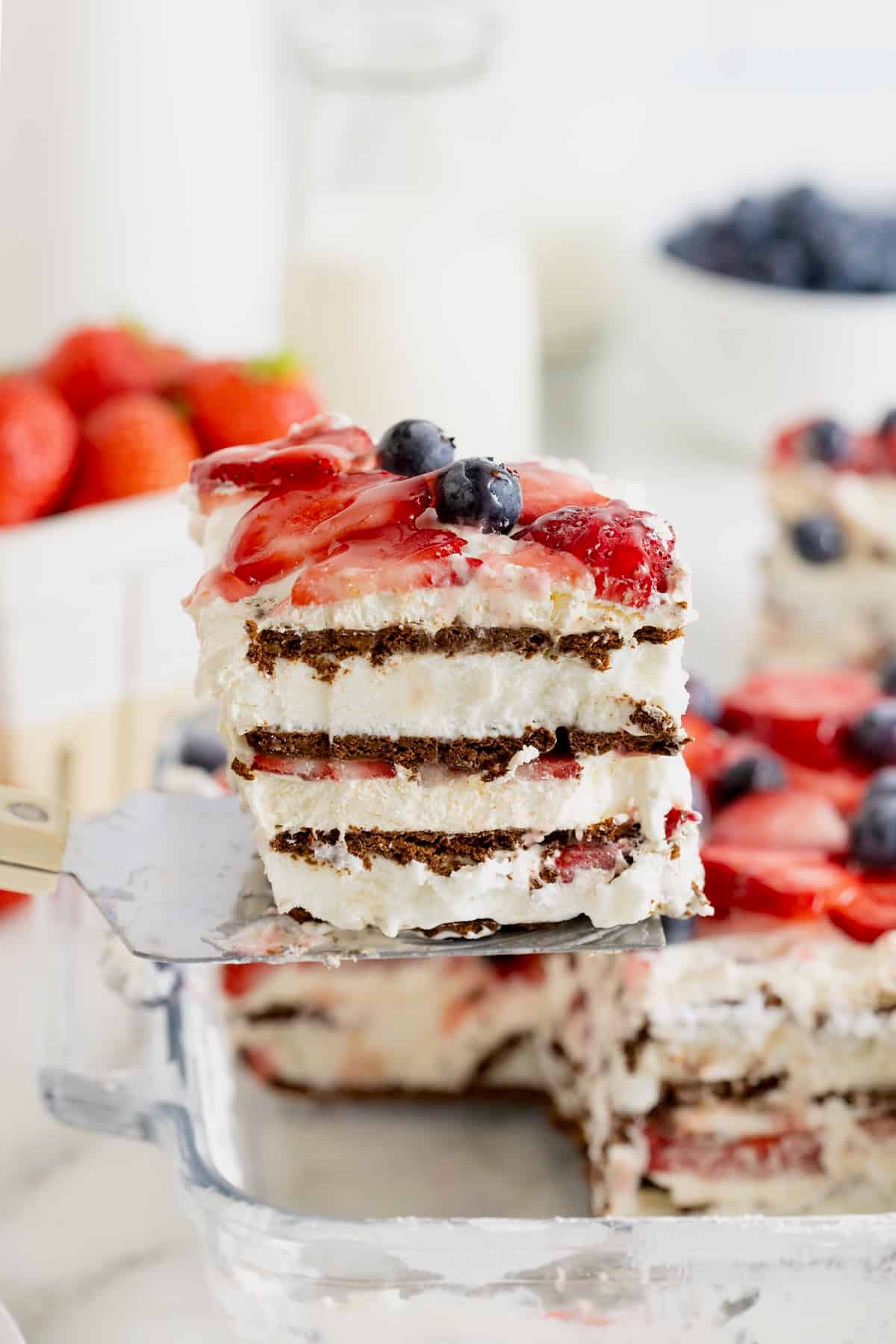 A slice of ice cream sandwich cake on a pie server.